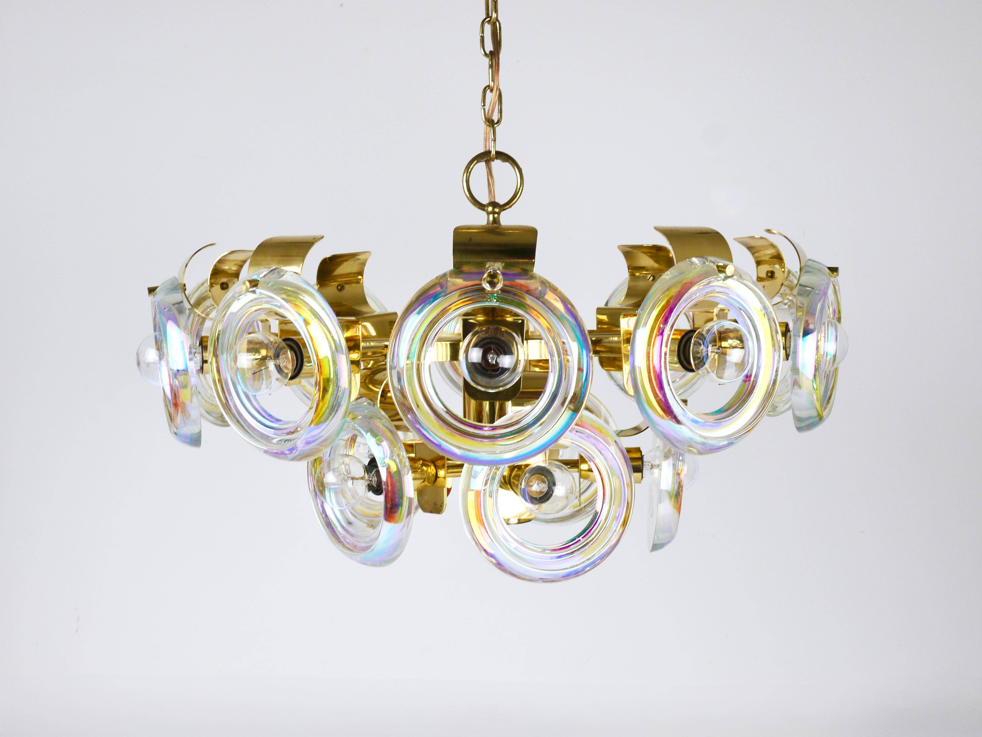 Large brass chandelier by Oscar Torlasco, rainbow optical glass rings, Italy, 1970s.