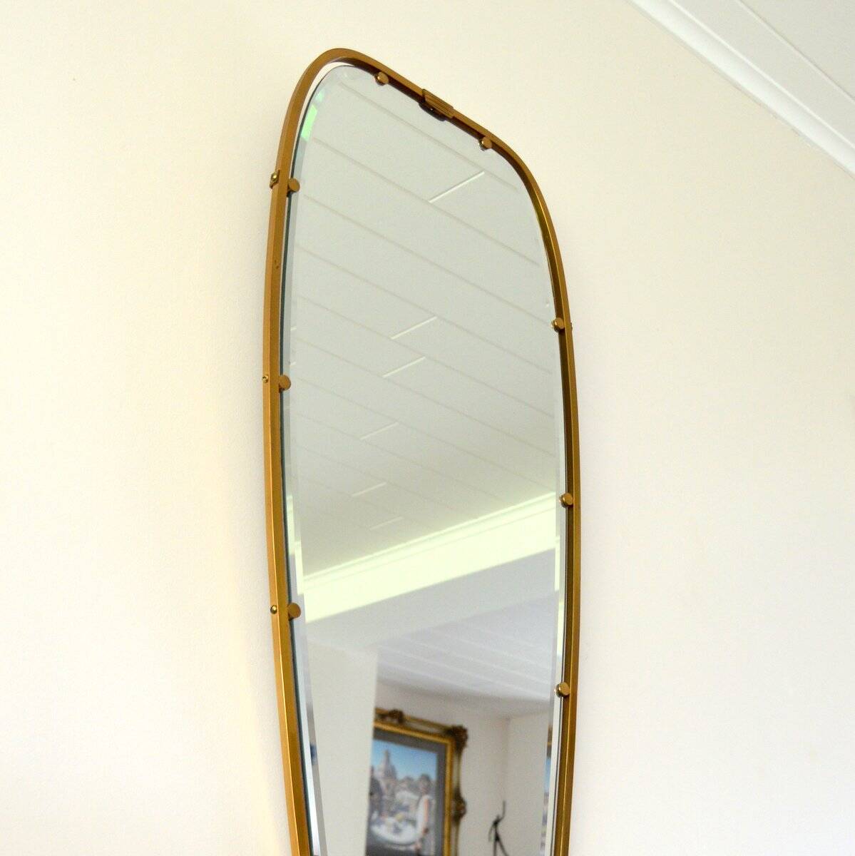 Superb free-form mirror in solid brass from the 50s/60s vintage.