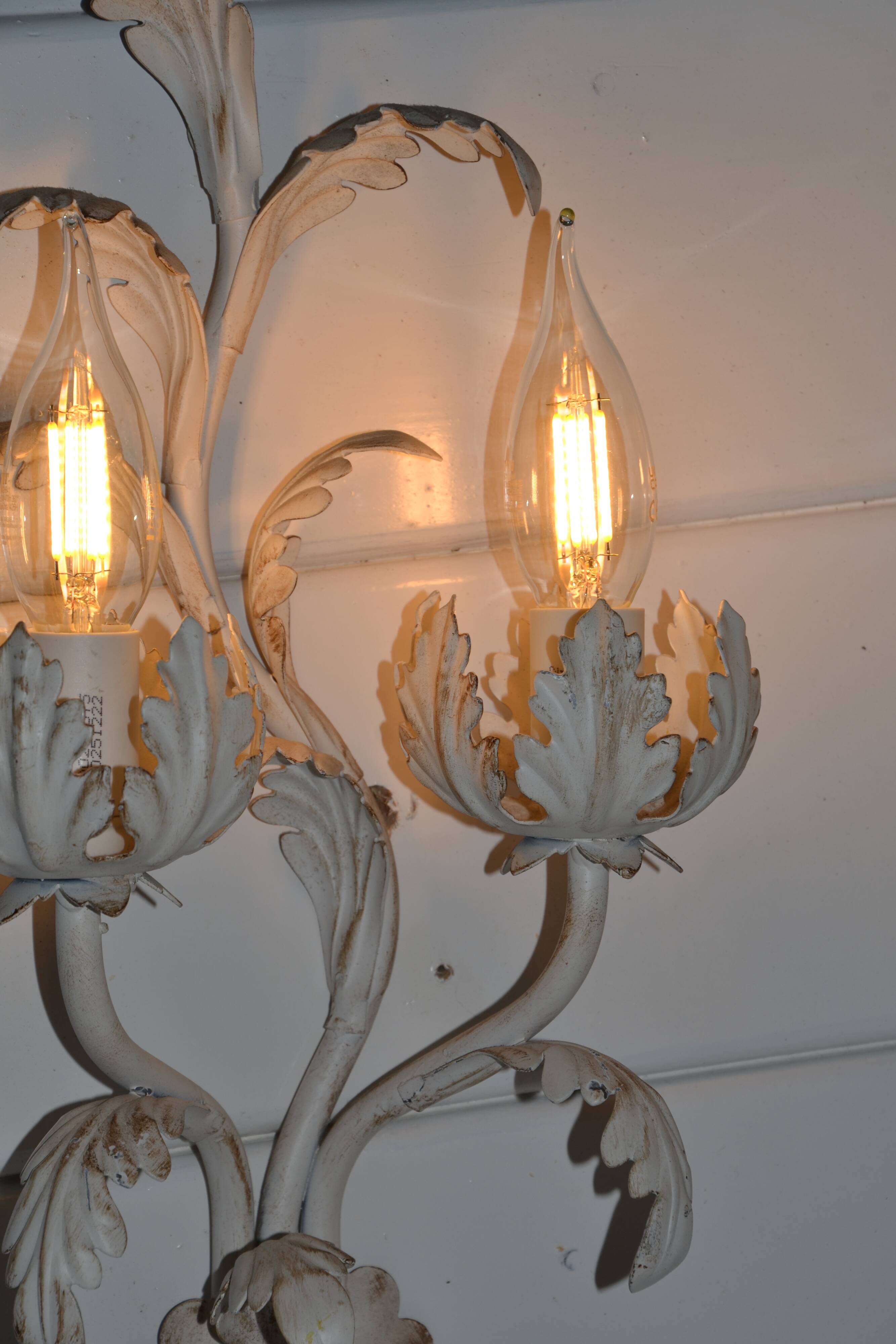 2 Florentine metal leaf wall lights