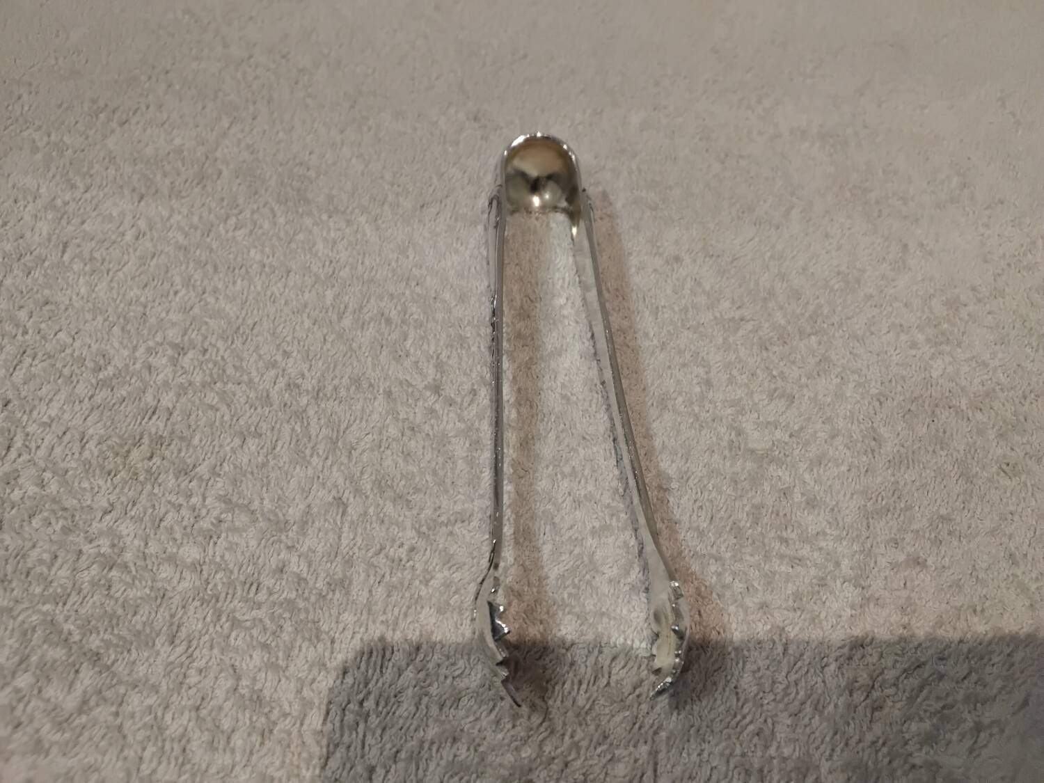 Silver-plated metal sugar tongs, Ercuis silversmith, Louis XV model, 29