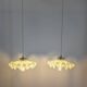 Pair of green opaline glass pendant lights – frosted poetry & Art Deco brilliance