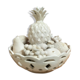 Trompe l'oeil fruit cut in white earthenware by Jean Roger, circa 1960.