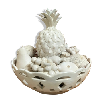 Trompe l'oeil fruit cut in white earthenware by Jean Roger, circa 1960.