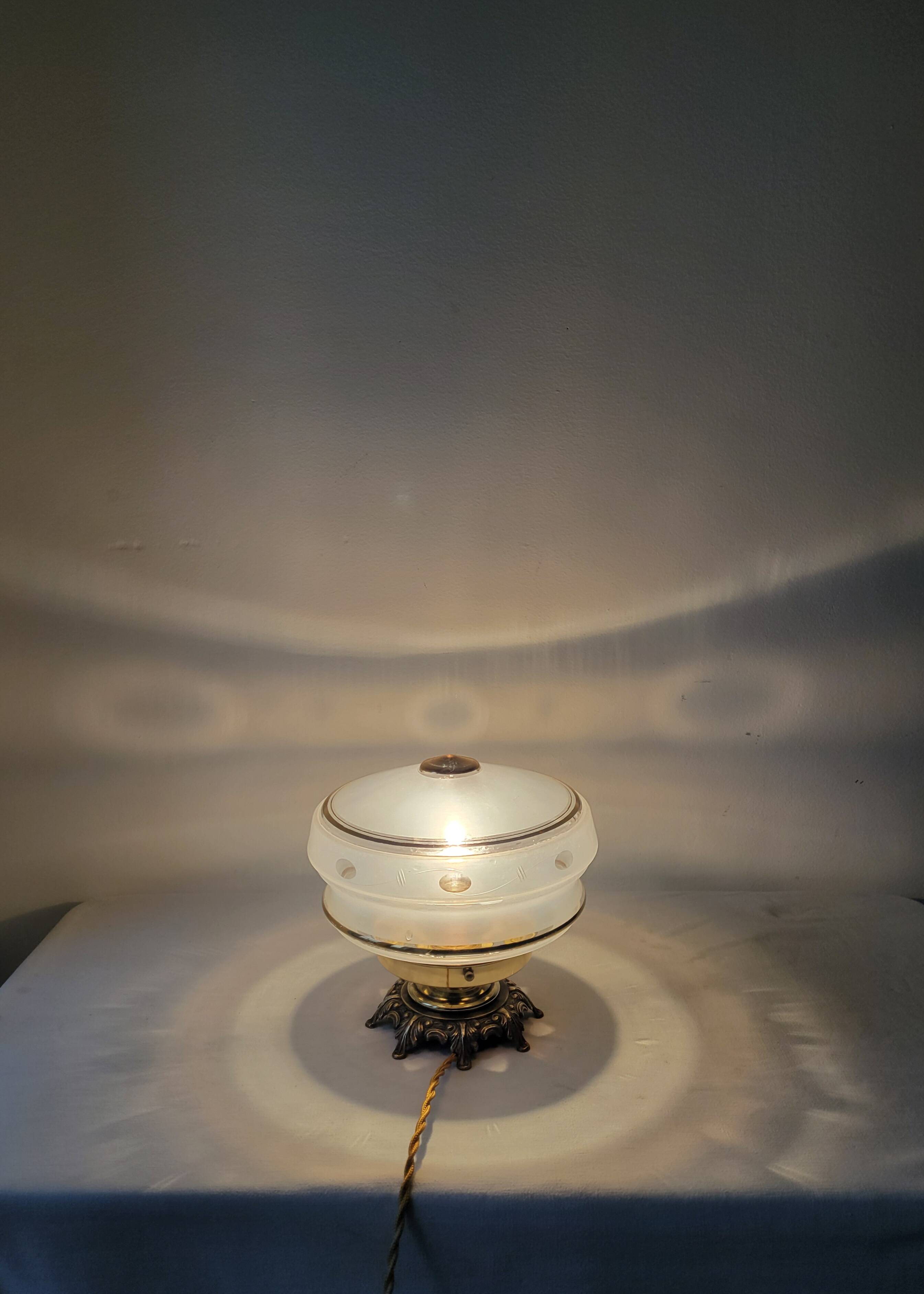 Brass and frosted glass lamp