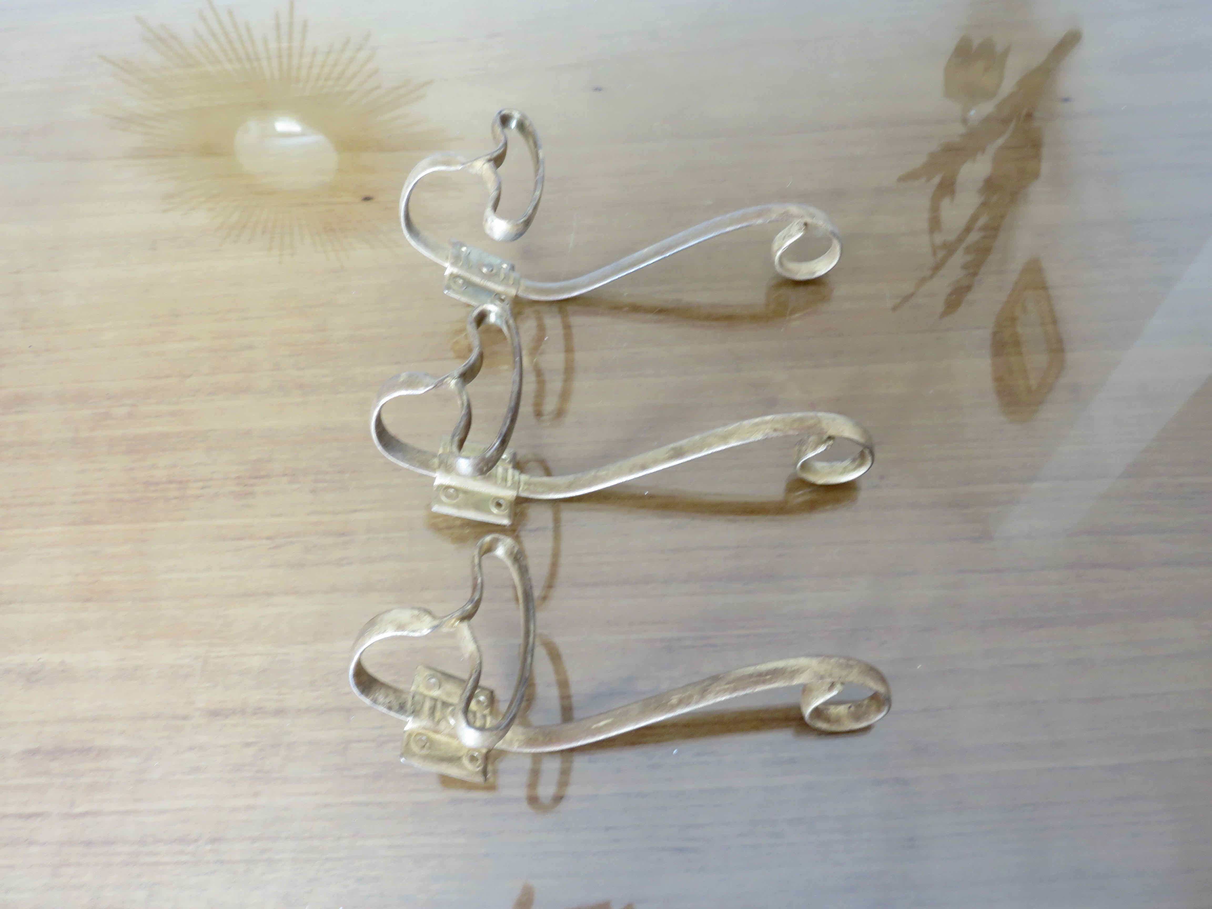 Series of 3 gilded metal hooks 40s 50s