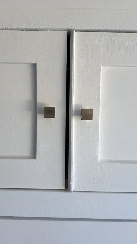 Vintage wardrobe in white wood