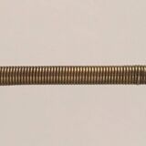 Black lacquered metal design magazine rack, perforated sheet and brass