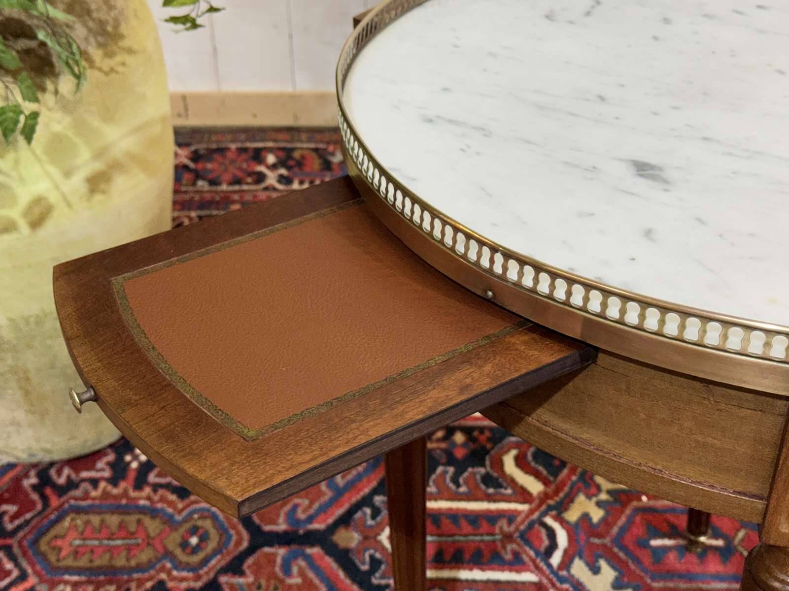 Louis XVI style bouillotte table from the 1960s in mahogany with a marble top.