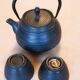 Black cast iron tea set