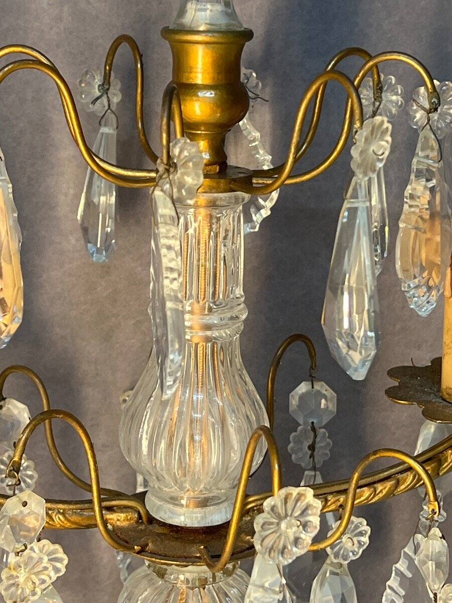 Pair of antique chandeliers, in brass with cut glass pendants, early 20th century