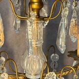 Pair of antique chandeliers, in brass with cut glass pendants, early 20th century