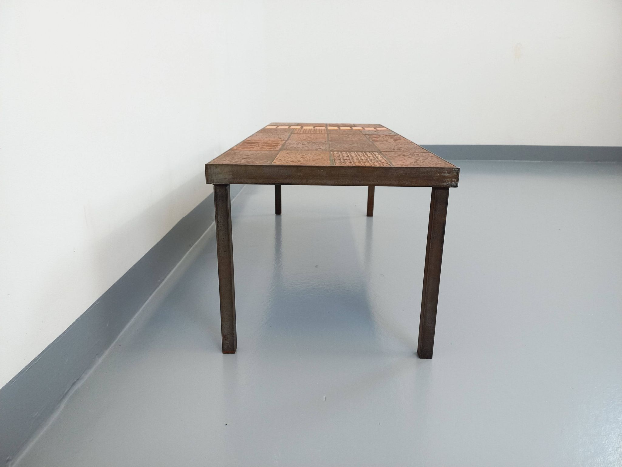 Vintage rectangular coffee table by Jean Jaffeux in steel and ceramic from the 60s