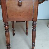 Pair of Louis Philippe style walnut bedside tables / work tables with flap