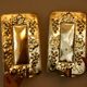 A pair of Swedish brass wall sconces from the mid-century.