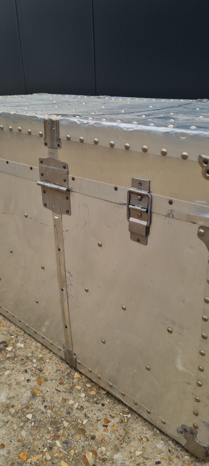 Riveted metal transport trunk