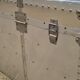 Riveted metal transport trunk