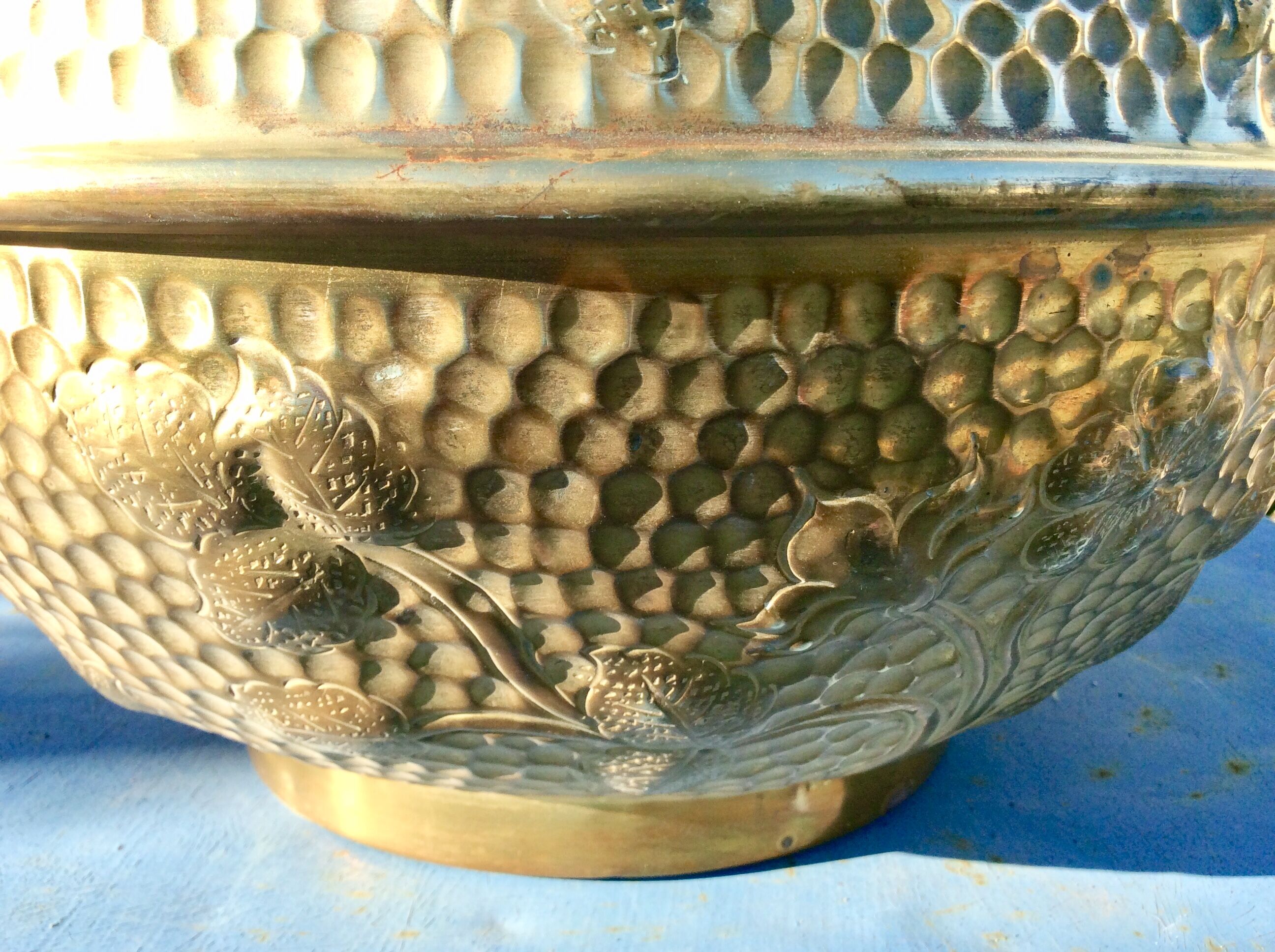 Old brass pot cover