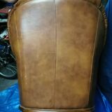 Brown leather armchair