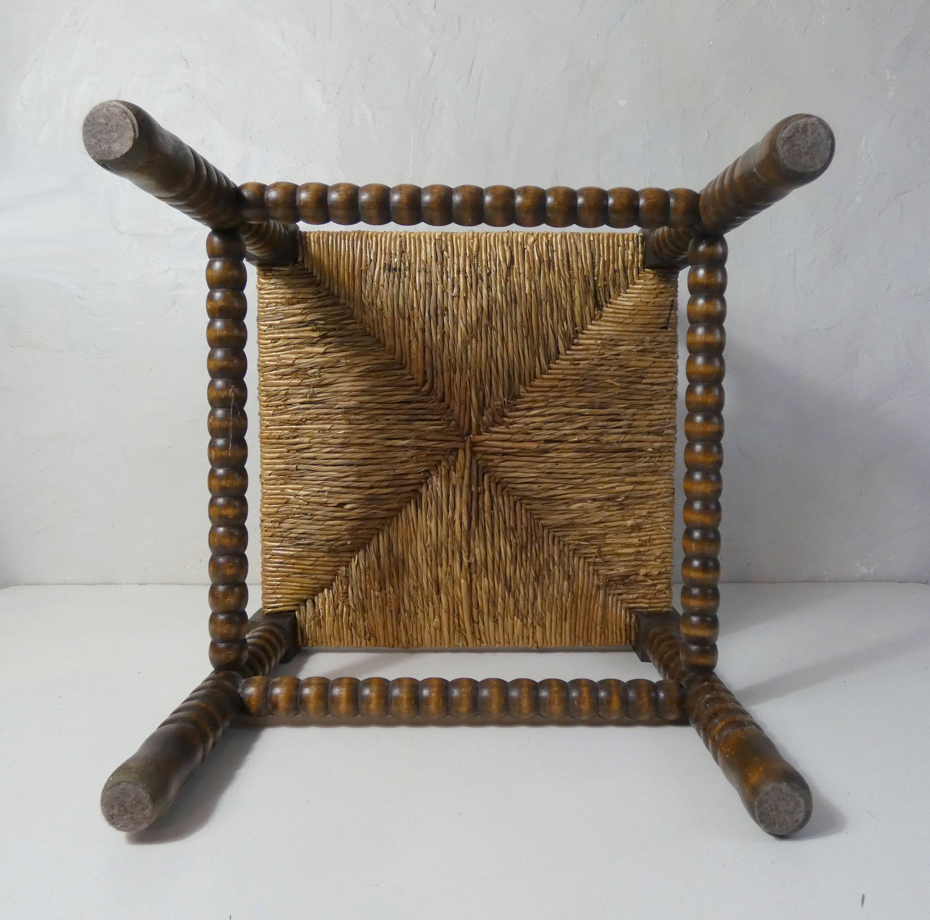 Old corner armchair beaded wood paillé