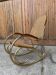 Vintage brass & cane rocking chair