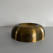 Flush-mounted disc-shaped brass fixture from the mid-century, 1960, Italy.