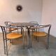 Table ronde vintage tubulaire en métal et verre fumé design année 70