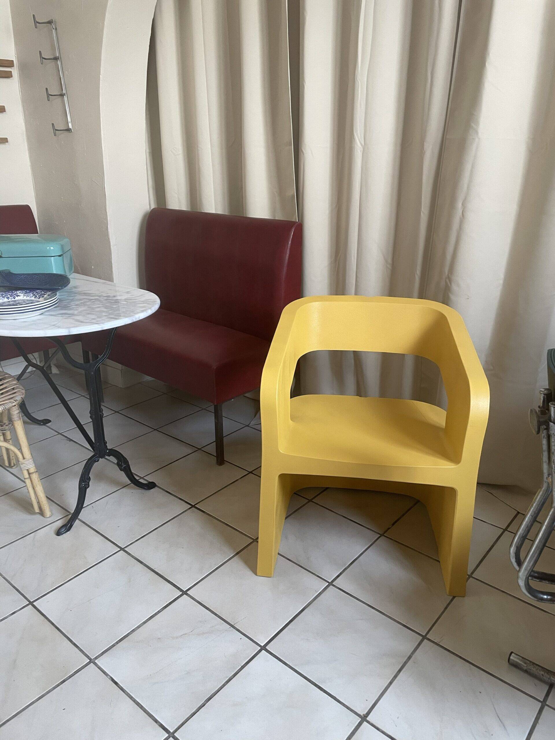 Orange-yellow designer armchair