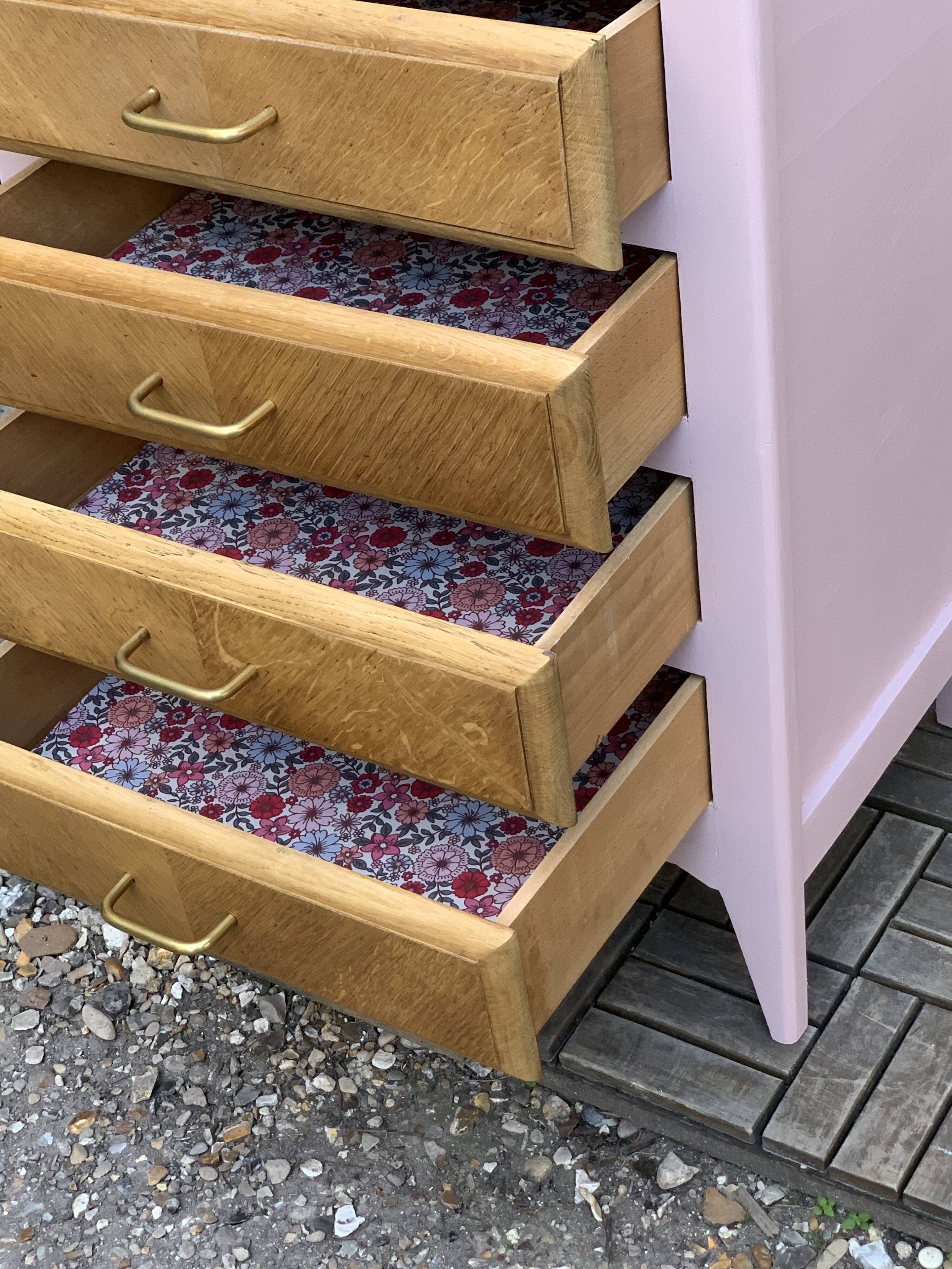 Vintage powder pink compass leg chest of drawers from the 1950s