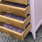 Vintage powder pink compass leg chest of drawers from the 1950s