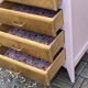 Commode vintage pieds compas rose poudré 1950