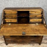 Louis XVI period chest of drawers in burr walnut with plum wood marquetry on all sides