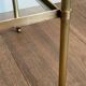 Pair of brass side tables attributed to Maison Jansen