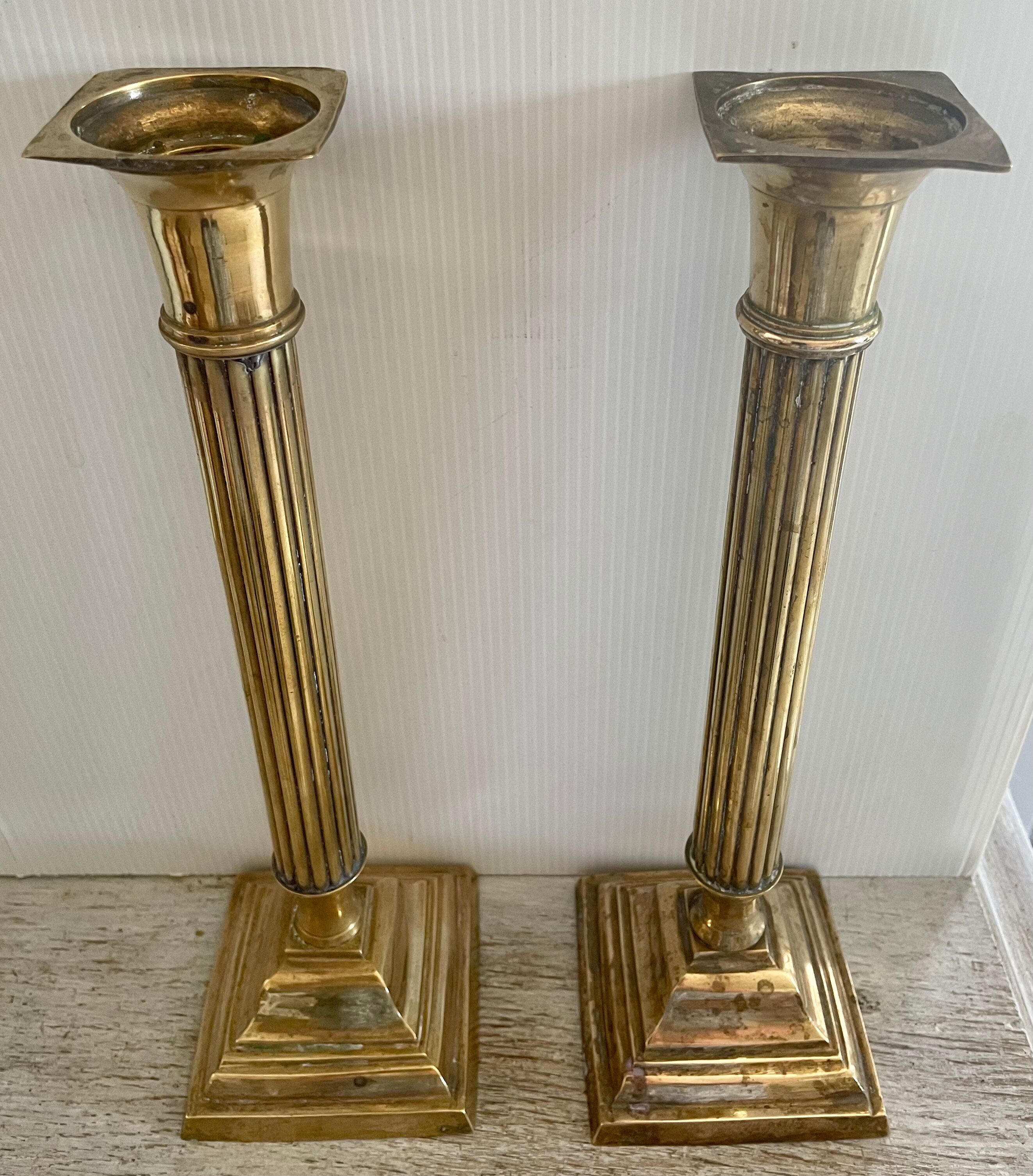 Payroll of brass column candle holders