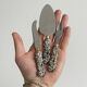 Antique shiny metal cheese cutlery