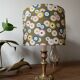 brass table lamp | khaki lampshade with multicoloured daisies