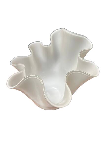 White glass vase in corolla shape