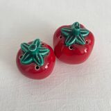 Vintage tomato salt and pepper shakers in slip