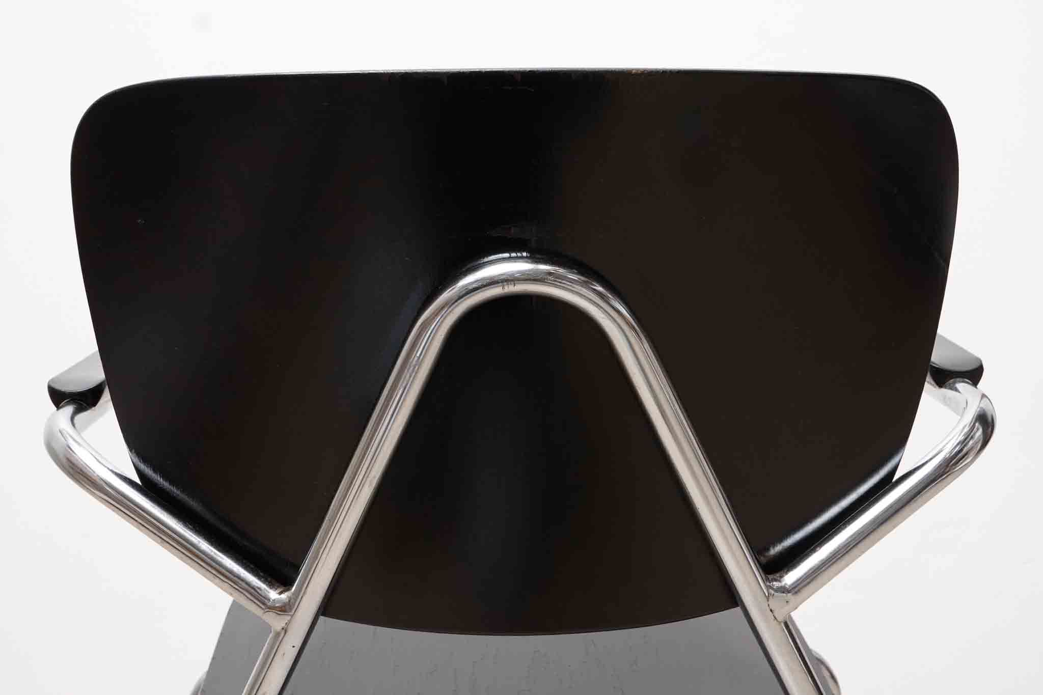 Vintage chair Kho Liang Black and metal with armrests