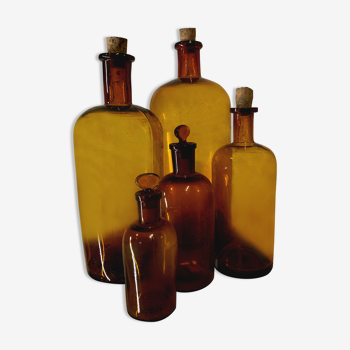 Lot of 5 bottles of amber glass apothecary