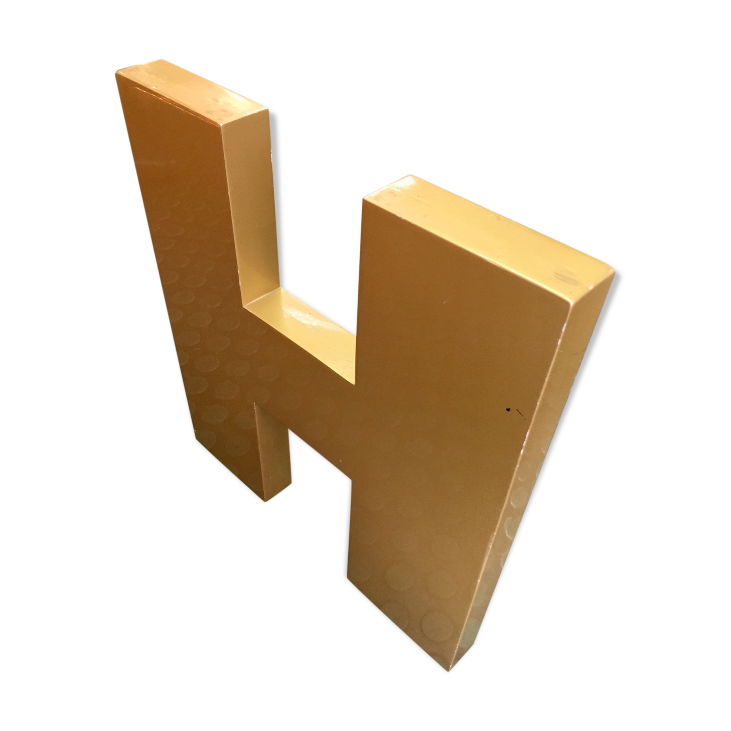 Golden sign letter h