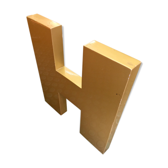 Golden sign letter h