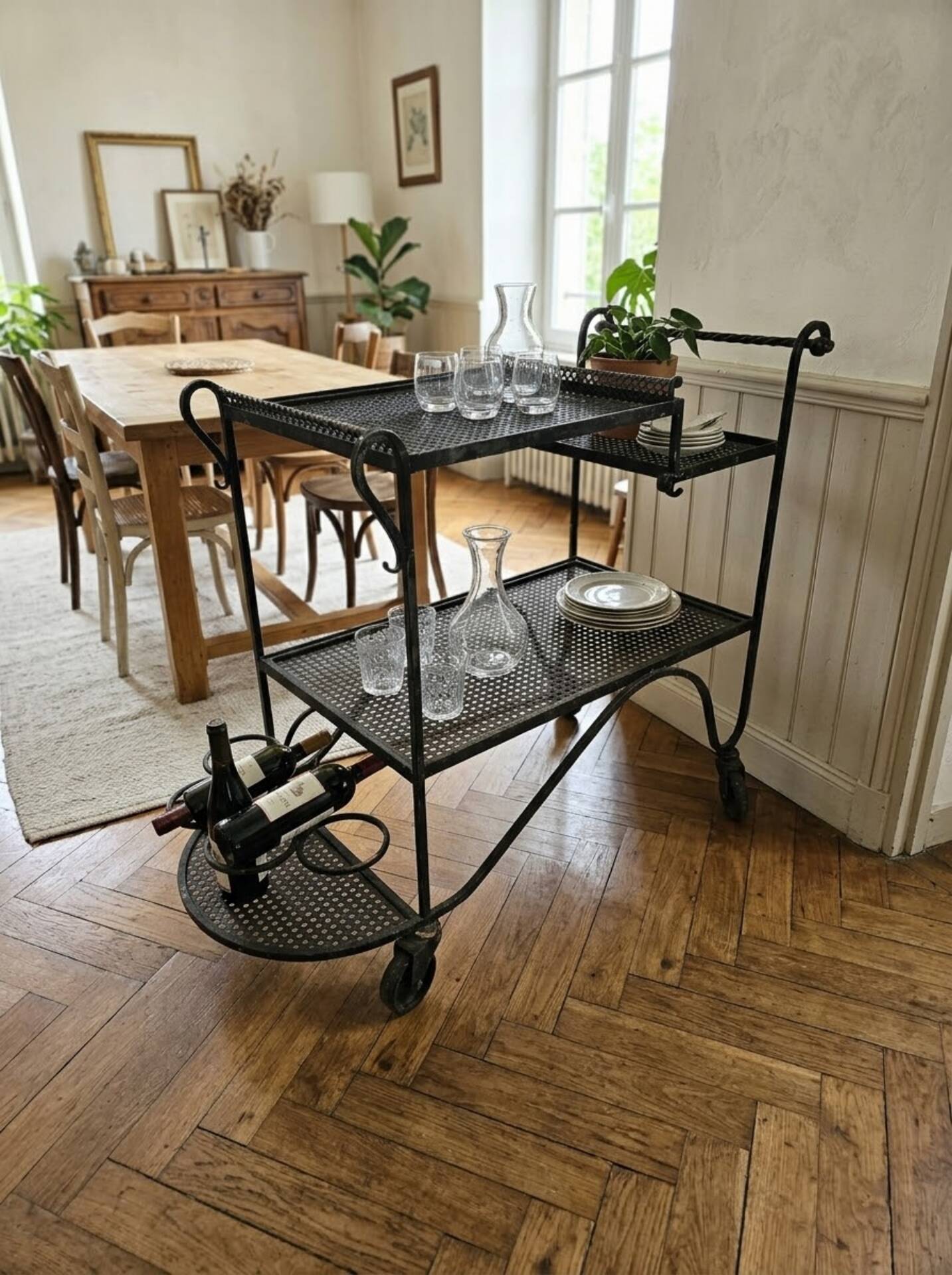 Perforated wrought iron rolling dessert trolley