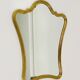 Curved wall mirror in gilded wood Chelini Firenze, mid-century, Italy, 1950s.