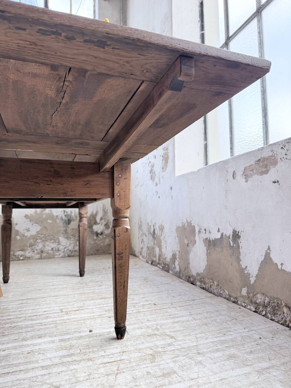 Solid oak farmhouse table with integrated extensions 1950