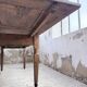 Solid oak farmhouse table with integrated extensions 1950