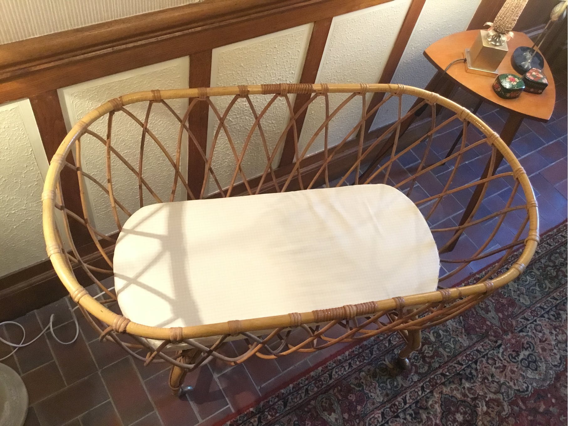 Vintage rattan cradle