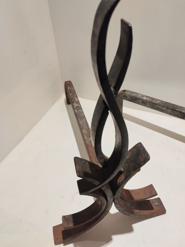 Paire de chenets en fer  forgé par Raymond Subes vintage