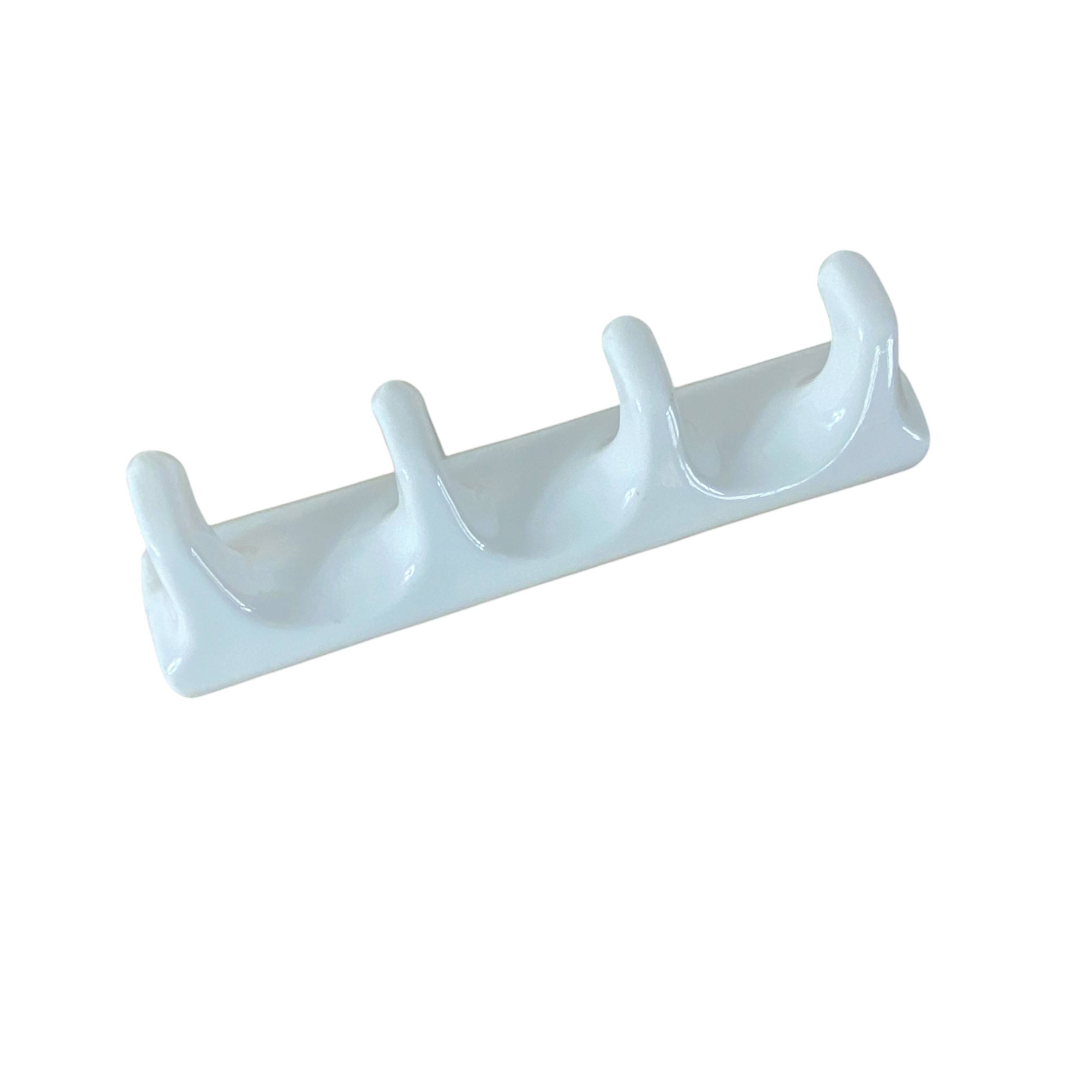 Vintage ceramic tea towel holder