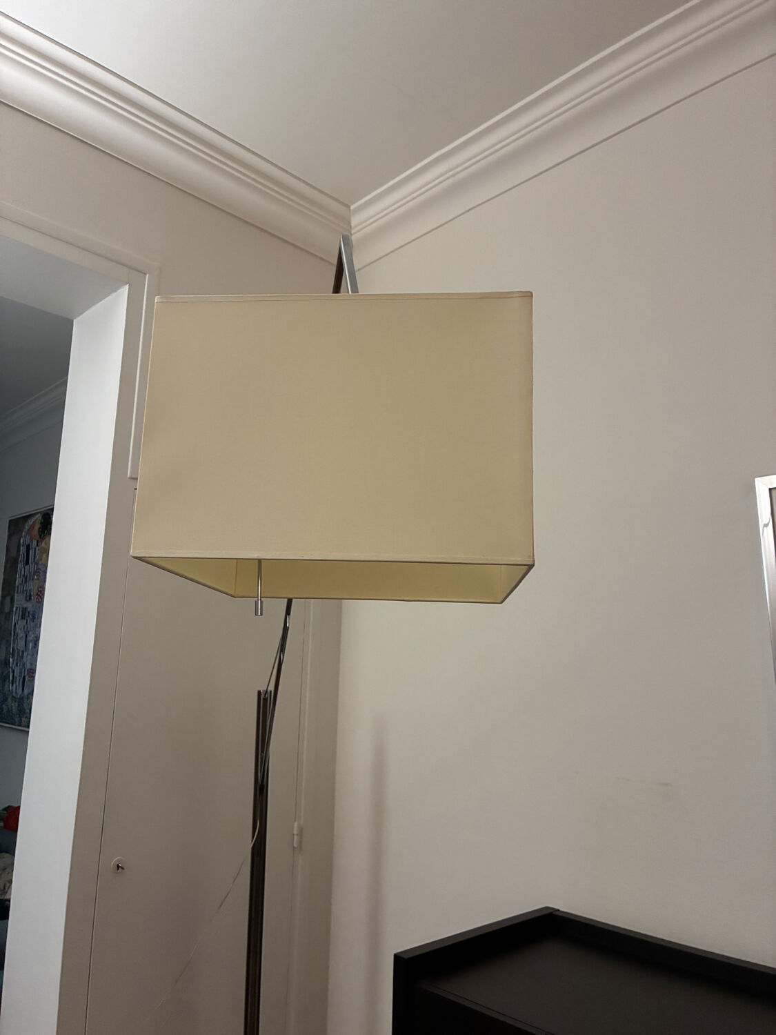 Cinna floor lamp in wood, chrome, and fabric.