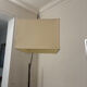 Cinna floor lamp in wood, chrome, and fabric.